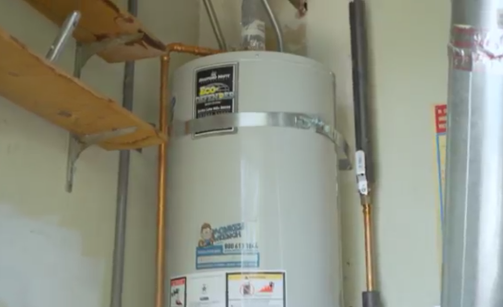 A Monkey Wrench installed conventional water heater.